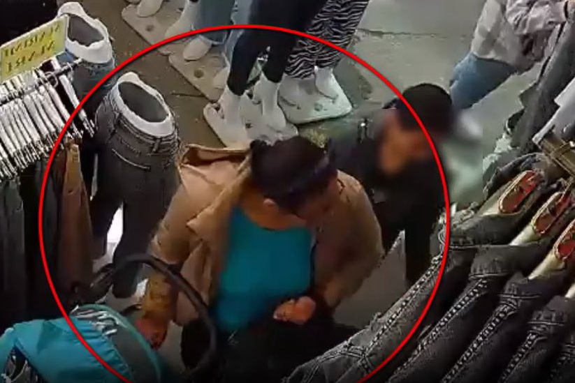 Кража портмоне в столичном магазине попала на видео